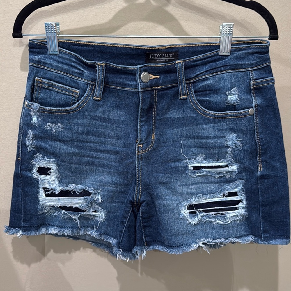 Judy Blue mid-rise denim patch shorts.